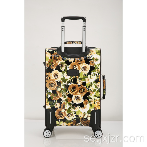 Tryckt Carry On Spinner Bagage